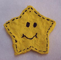 paper mache star Christmas ornament